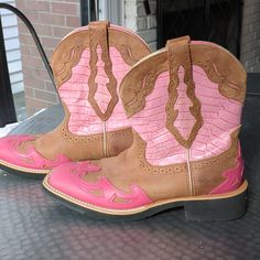 Pink And Brown Ariat Boots. Never Worn. Casual Pink Boots With Reinforced Heel, Casual Pink Snip Toe Boots, Pink Western Boots With Round Toe, Pink Western Style Closed Toe Boots, Casual Pink Slip-on Boots, Brown Western Boots, Ariat Cowboy Boots, Pink Cowboy Boots, Black Leather Cowboy Boots