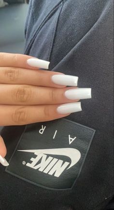 Looking for a cute manicure to show off when you raise your hand in class? try any of these back-to-school nails to inspire your next mani. Coffin White Nails Design, Girly Acrylic Nails White, Medium Nails White, White Nail Inspo Coffin, Medium White Nails, Simple White Acrylic Nails, Basic White Nails, White Acrylic Nails Coffin, Nails Long White