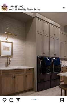 an image of a laundry room with washer and dryer in the middle of it