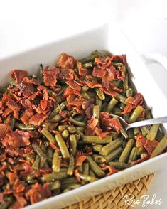 old fashioned green beans with bacon and brown sugar in a white casserole dish