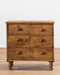 an old wooden dresser with four drawers