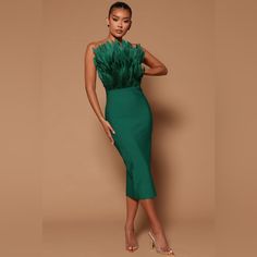 Product Details Bandage Midi Dress Tube Feather Detail Back Zipper Stretch Disclaimer: Feather Fall Out May Happen. 100% Polvester Imported Disco Attire, Pink Green Fashion, Graduation Outfits For Women, Outfits Moodboard, Cruise Formal Night, Creative Black Tie, African King, Dress Poses, Wedding Dress Code