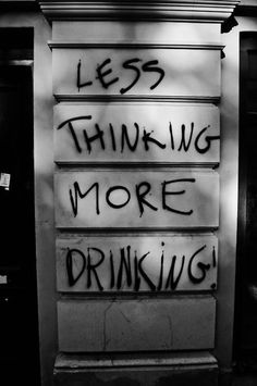 a sign that says less thinking more drinking