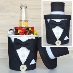 a black and white tuxedo can cooler filled with beer, candy, candies and liquor