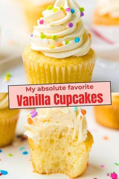 vanilla cupcakes with white frosting and sprinkles on the top