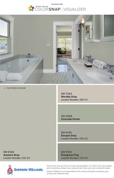 the color scheme for this bathroom is blue and gray, with white trim on the walls