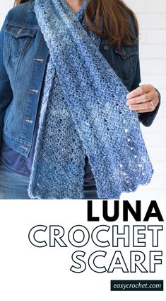 a woman wearing a blue scarf with text overlay that reads luna crochet scarf