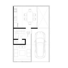 the floor plan for a house with two cars parked in it