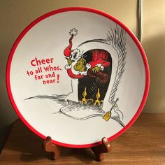 a plate with the image of dr seuss and cat in the hat on it