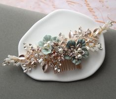 Large  Wedding Hair Comb , Bridal Hair Comb ,Wedding  Hair Piece, Leaf Bridal Headpiece, Floral Hair Comb,  Wedding Hair Accessory   Wedding hair comb   Colour:  gold /clear/lt.ivory/green Measurements: approx  7 inches, width approx 2 inches.NOTE: Large and not light weight! Materials:  metal leaves and flowers,lt. ivory faux pearls, white opal ab beads, jewelry  wire , comb. Great for wedding or other celebration. BRIDAL JEWELRY: https://www.etsy.com/shop/BridalArtDeco/items?ref=seller-platfor Gold Sage Wedding, Floral Bridal Hair, Bridal Hair Pin, Wedding Hair Piece, Hair Comb Bridal, Sage Wedding, Large Wedding, Floral Hair Combs, Wedding Hair Comb