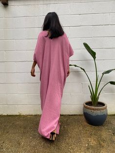 Embrace the gentle waves and sunny shores with our double gauze cotton kaftan in bubblegum pink. This versatile floor-length kaftan falls gracefully just above the ankles (depending on your height), making it the perfect beach dress or cover up. Crafted from light and airy double gauze cotton, it's your essential for a night on the town, a day by the sea, or just running errands. Pink Floor-length Kaftan For Summer, Flowy Pink Printed Kaftan, Luxury Pink Kaftan For Beach Cover-up, Pink Floor-length Summer Kaftan, Pink Long Sleeve Beach Cover-up Kaftan, Bubblegum Pink Dress, Cotton Kaftan Dress, Cotton Kaftan, Hang Loose