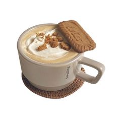 a cup of hot chocolate with whipped cream and cookies