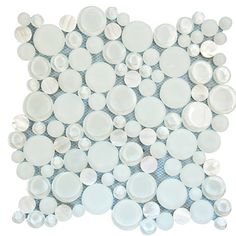 white glass and pearl mosaic tiles on a blue checkered tablecloth with circles in the middle