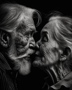 an old couple kissing each other with their faces close to one another, black and white photograph