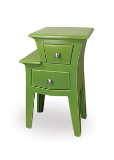 a small green table with two drawers on each side and one drawer at the top