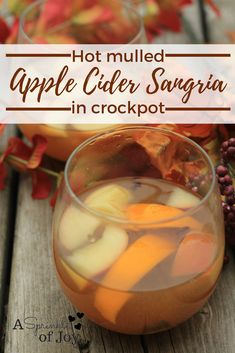 hot mulled apple cider sangria in crockpot with text overlay