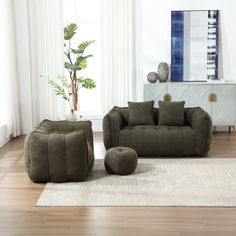 a living room filled with furniture and a rug