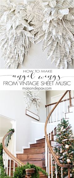 an old book page wreath is hung on the wall next to a stair case and christmas tree