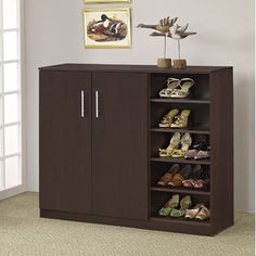 a shoe cabinet with two doors and three shelves