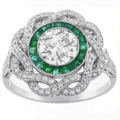 Art Deco 0.95ct Old Mine Diamond Emerald Platinum Engagement Ring, The ring is set with a sparkling old mine cut diamond that weighs approx 0.95ct. The center stone is accentuated by vivid square cut emeralds that weigh 0.48ct. . Around the emerald stones are glittering round cut diamonds that weighs approximately 0.78ct. Vintage Jewlery, Old Mine Cut Diamond