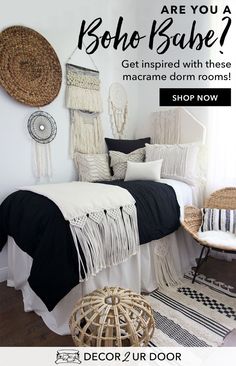 a bedroom with black and white decor on the walls, bedding and rugs