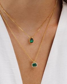 Introducing the Duchess Pendant Necklace with a stunning emerald green CZ stone - an elegant addition that adds a pop of color to your neckline. Crafted with timeless charm, the pendant showcases a classic emerald-cut stone design. The white CZ pave stones add a touch of sparkle, ensuring you'll shine in any crowd.   * Material: 18K Gold on Brass / Sterling Silver. * Special anti-tarnish protective coating. * Length: 16"+ 2" extender - 18" in total. * Stone: 5A Emerald green and white zirconia * Square Emerald Necklace, Elegant Birthstone Necklace With Rectangular Stone, Formal Emerald Necklace With Rectangular Pendant, Elegant Rectangular Emerald Necklace For Formal Occasions, Elegant Rectangular Emerald Necklace For Formal Events, Elegant Rectangular Emerald Necklace, Elegant May Birthstone Necklace For Party, Elegant May Birthstone Party Necklace, Elegant Emerald Necklace With Rectangular Pendant May Birthstone