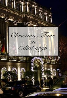 cars parked in front of a building with christmas lights on it and the words christmas time in edinburgh