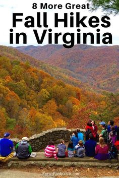 people sitting on a stone wall overlooking the mountains with text overlay that reads 8 more great fall hikes in virginia