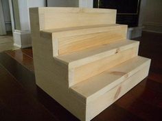 some stairs made out of wood in a house