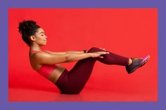 a woman is sitting on the floor with her legs crossed and wearing red tights