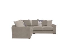 a gray couch with pillows on top of it