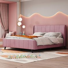 a bedroom with pink walls and a large bed