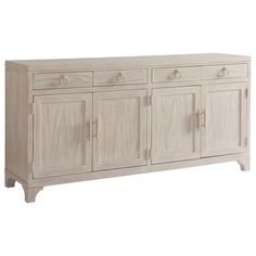 the sideboard has four doors and two drawers