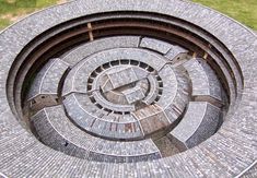 the circular bench is made out of bricks