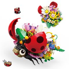 a ladybug is sitting on top of a pile of toys