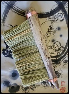 a close up of a bamboo stick on a table