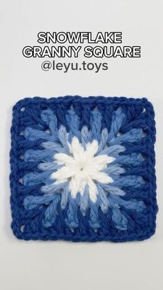 the snowflake granny square is shown in blue and white