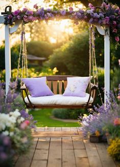 a wooden swing with purple pillows on it