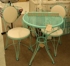 a table and chairs are on display in a store