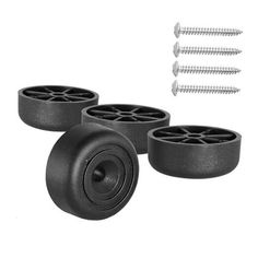 three black plastic wheels with screws on them