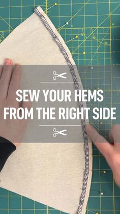 someone cutting fabric with scissors on top of a piece of cloth that says sew your hems from the right side