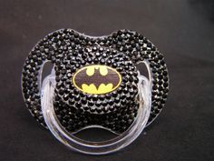 a mickey mouse head with a batman symbol on it