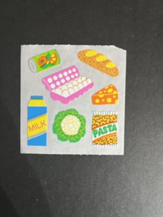 a piece of paper that has some stickers on it with food and drink items