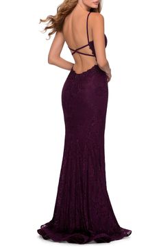 Make a dazzling entrance in this crystal-adorned lace dress styled with a dramatic plunging neckline and side slit and finished with a strappy back. 60" length Back zip closure Deep V-neck Shoulder straps Side slit Lined 100% polyester Spot clean Imported Women's Clothing Deep Purple Prom Dress, Dark Purple Dresses, Prom Dress Inspo, Lace Dress Styles, Purple Prom Dress, Elegant Prom Dresses, Lace Prom Dress, Prom Dress Inspiration, Lace Mermaid