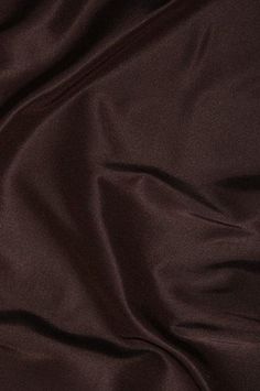 a close up view of a dark brown fabric