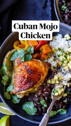 a bowl filled with black beans, rice and chicken