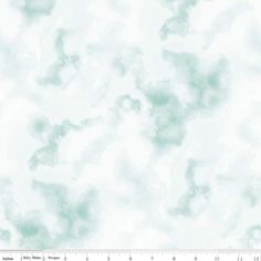 a white and green marble textured wallpaper with a ruler in the foreground