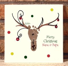 a christmas card with an image of a reindeer's head and the words merry christmas, santa & papa on it