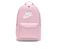 Show off your athletic style with the Nike® Heritage Backpack this year. This classic style backpack has a large main compartment with laptop pocket, and additional side pockets for added storage. The iconic Nike® branding details will make you a standout in the hallway just like you're a standout on the court! Synthetic upper, Adjustable padded shoulder straps,18 inches H x 11 inches W x 5 inches D, Padded back, Large zippered compartment with laptop pocket, Two side zip pockets, Front zip pocket, Top loop handle, Nike® branding elements | Unisex Nike Heritage Backpack in Pink Foam Nike Pink Backpack, Nike Backpack For Back To School, Sporty School Bags With Logo, Sporty Gym Backpack For Back To School, Sporty Standard Backpack For College, Casual Gym Standard Backpack, Nike Sports Backpack For Back To School, Sporty Streetwear Bags For Back To School, Casual Backpack For Gym And Back To School