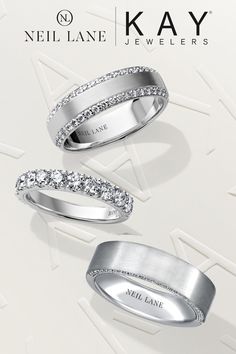 three wedding bands with diamonds on them and the words, new lane jewelers in white gold